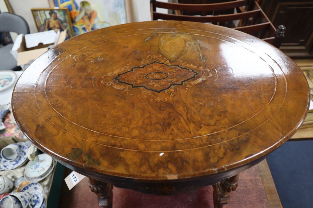 A Victorian inlaid walnut work table, with oval top, width 60cm